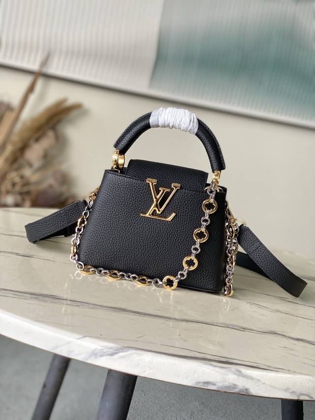 Premium Original Leather M12936 Black Mini. This Capucines Mini handbag is craf