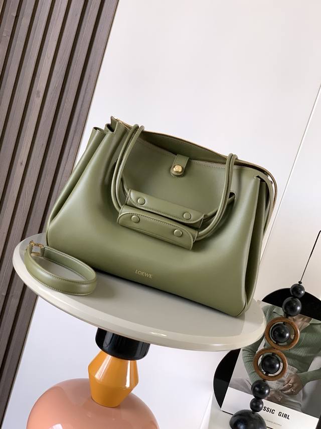 Large soft cowhide leather Madrid handbag Madrid has a soft structured trapezoid