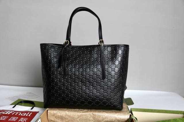 Price in quantity Description: Gg Emblem Large Tote. This tote features the bra