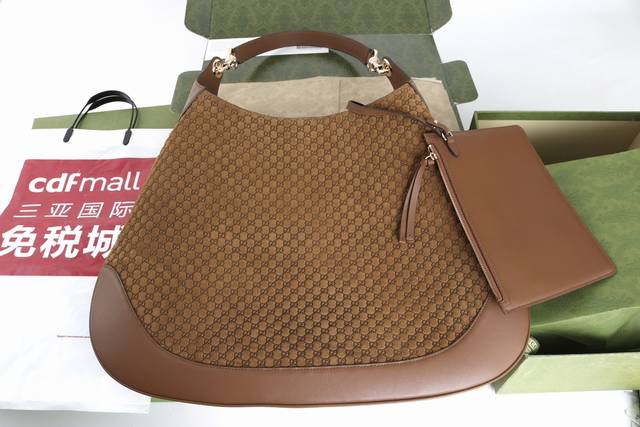 Price in quantity Description: This handbag combines practical functionality wi
