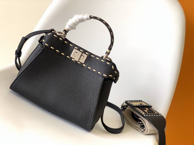 peekaboo small handbag, lychee texture material, hand-stitched, decorated with c