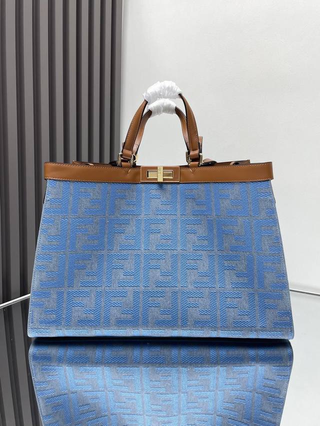Blue denim peekaboo X-Tote Classic monogram canvas paired with peekaboo's class