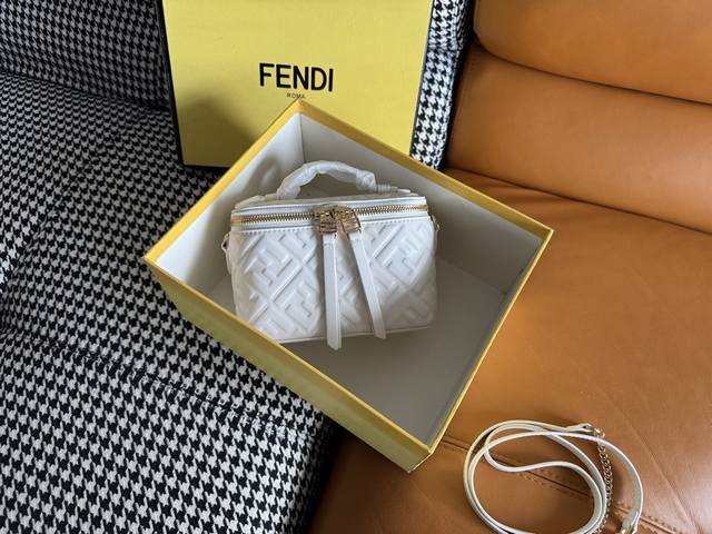 The compact Fendi Vanity bag, with its upright silhouette, features a double sli
