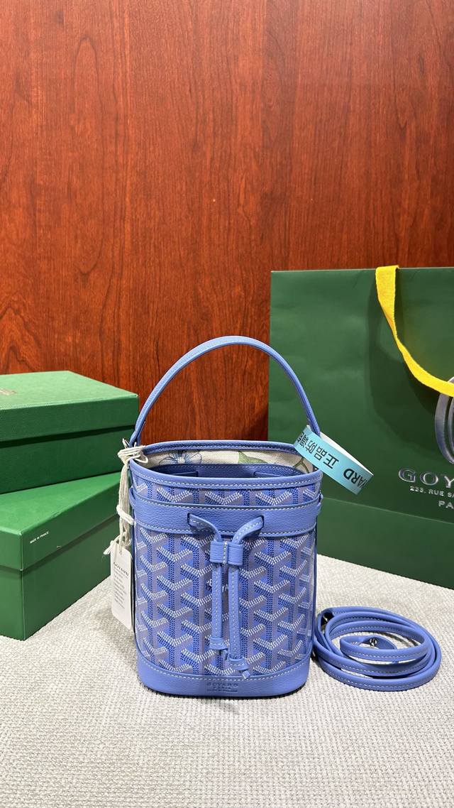 New colors have arrived: iris purple and rose pink. Goyard's new mini bucket ba