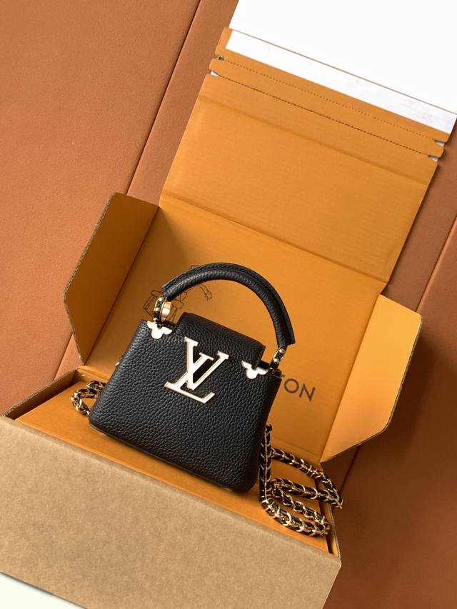 Special All-Steel M10166 Black Gold This ultra-mini Capucines Nano handbag is fr