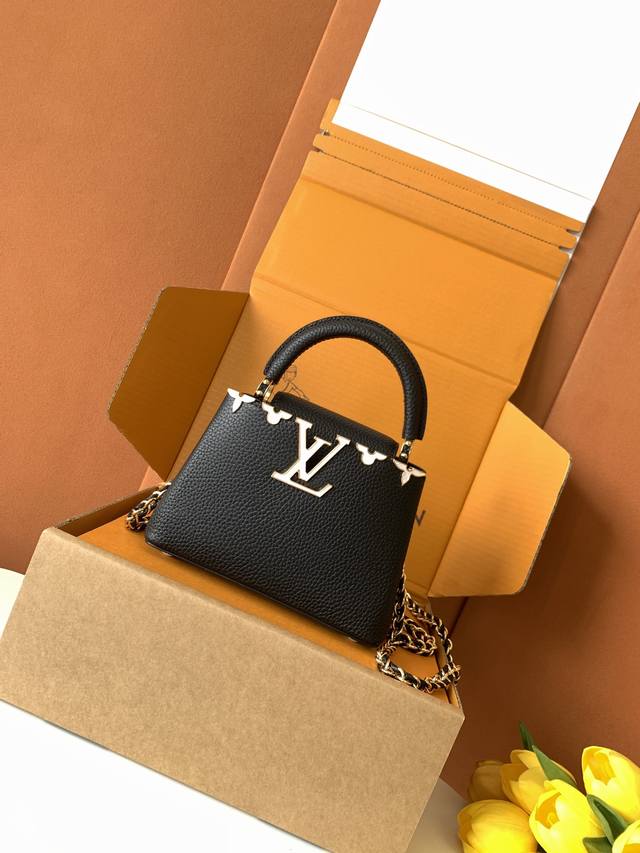 Extra-grade steel M10167 black. This Capucines Nano handbag, from the Capucines