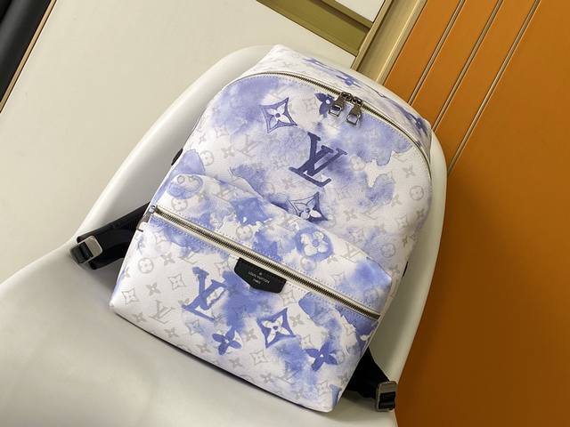 163C01 Chip, Premium Original M45760 Discovery Backpack in Watercolor Blue. Desi