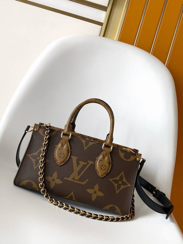 M14236 Top Original Single Dynamic 163 This Onthego East West bag features Monog