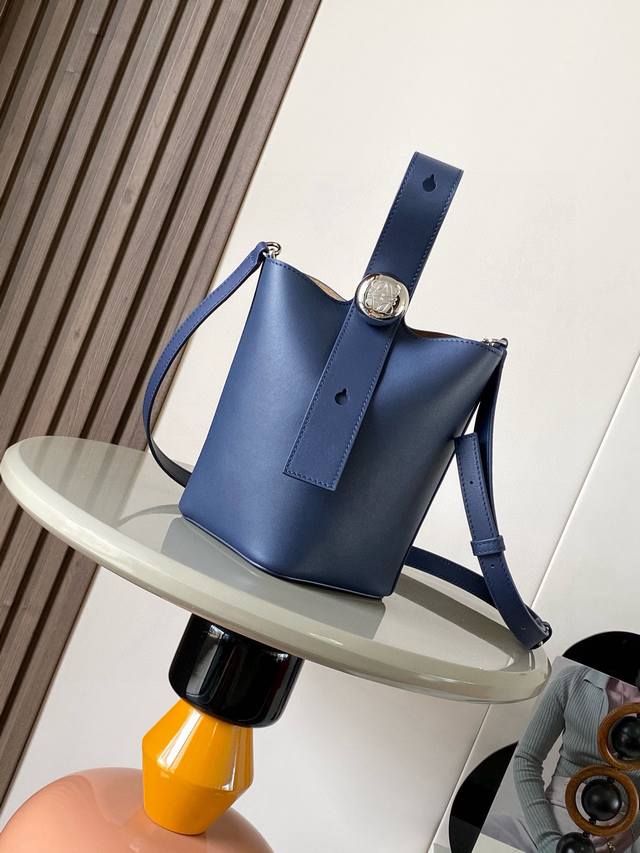 Original leather Mini soft grained cowhide leather pebble bucket bag. The pebble