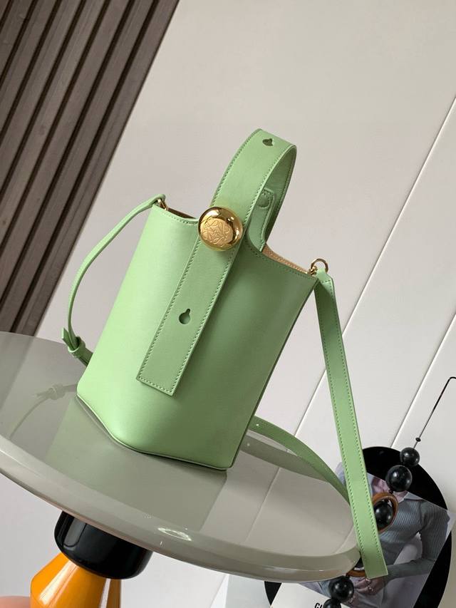 Original leather Mini soft grained cowhide leather pebble bucket bag. The pebble