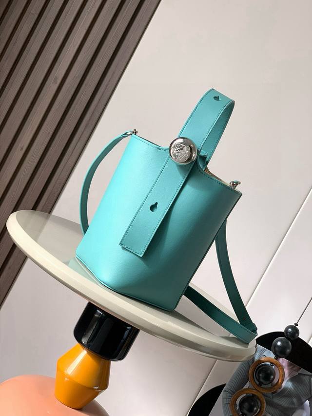 Original leather Mini soft grained cowhide leather pebble bucket bag. The pebble