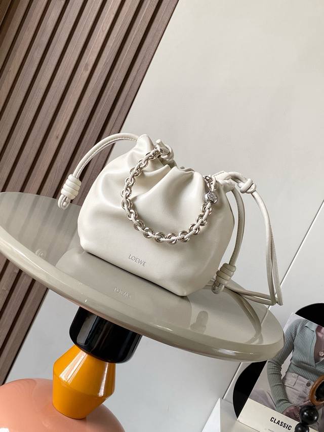 Original leather The new Flamenco Purse clutch in the same mini nappa leather as