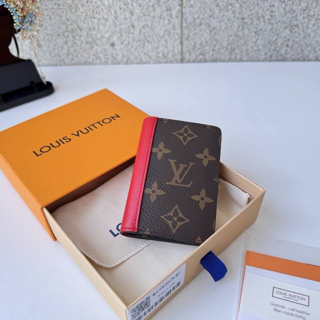 Authentic, top-grade, original 12830 red wallet. Compact in size, it fits easily