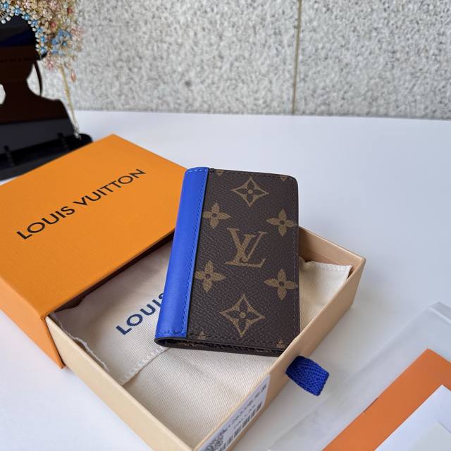 Authentic, premium 12833 blue wallet. Compact in size, it fits easily into any p