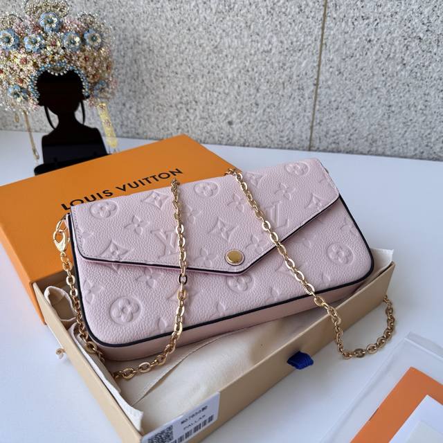 Authentic Top-grade original M67856 pink. Crafted from Monogram Empreinte canvas
