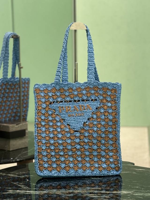 Authentic Raffia Tote Bag This softly deconstructed tote is crafted from raffia,