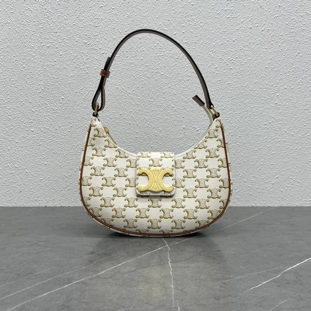 Authentic new product details. The Ava underarm bag with a large logo and monogr