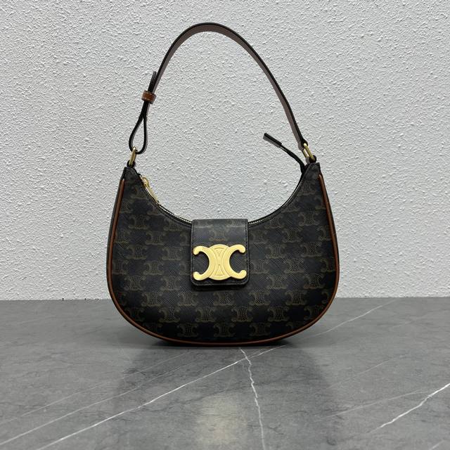Authentic new product details. The Ava underarm bag with a large logo and monogr
