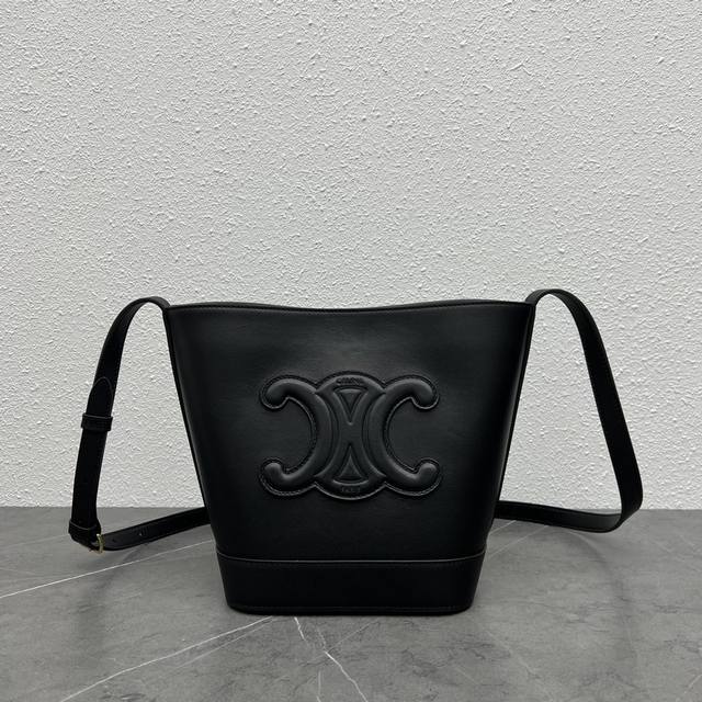 Authentic Celine's new spring/summer Cuir bucket bag features a large, 3D Arc de