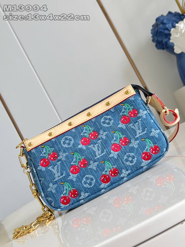 The premium original M13994 pochette accessories handbag joins the Louis Vuitton