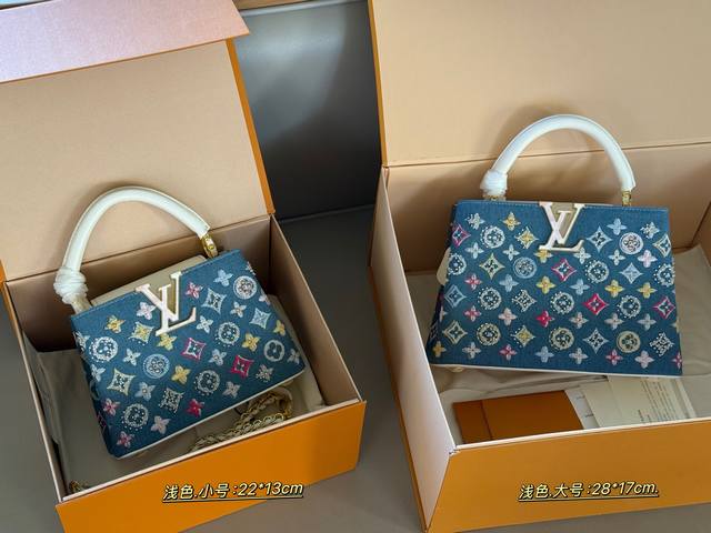 Comes in a box. Size: 22*13cm (small), 28*17cm (large). L's Capucines handbag.