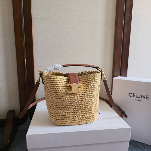 New arrival: Ce's new Mini Straw Bucket Bag. Made from lustrous calfskin, this