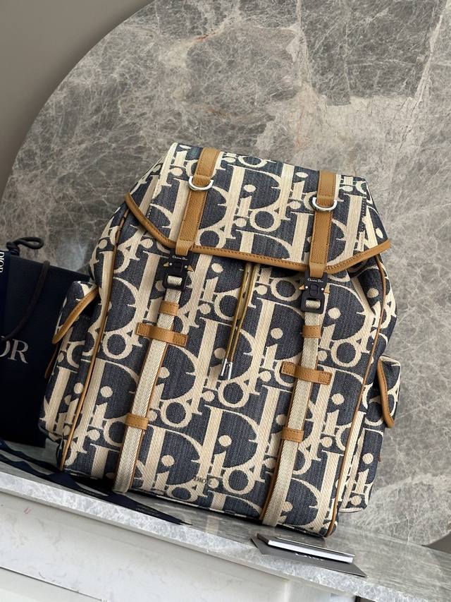 Authentic This Dior Hit The Road backpack with flap combines modern style with D