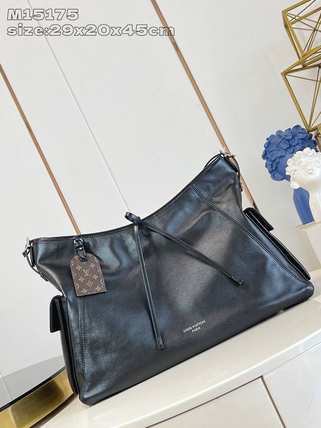 Original leather Exclusive photo M15175 This Carry All Travel Bag is crafted fr