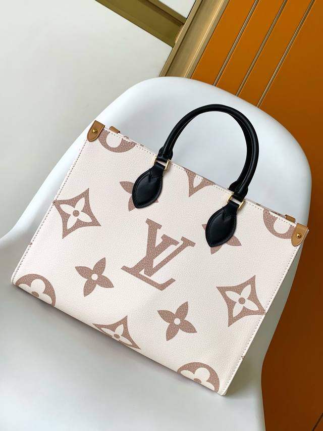 M46912 Premium Original Dynamic Chip. This Onthego medium tote features a Monogr