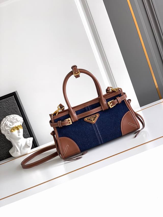 Softlux denim and leather new Bonnie mini denim bag. This mini crossbody handbag