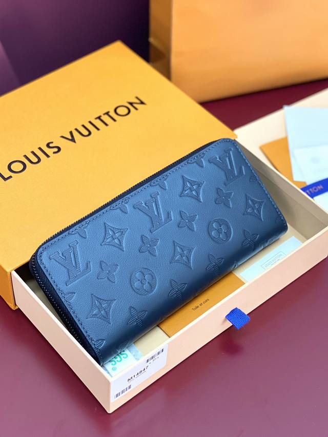 Factory Price p M14847 Blue! This iconic Zippy wallet, crafted from Monogram ca