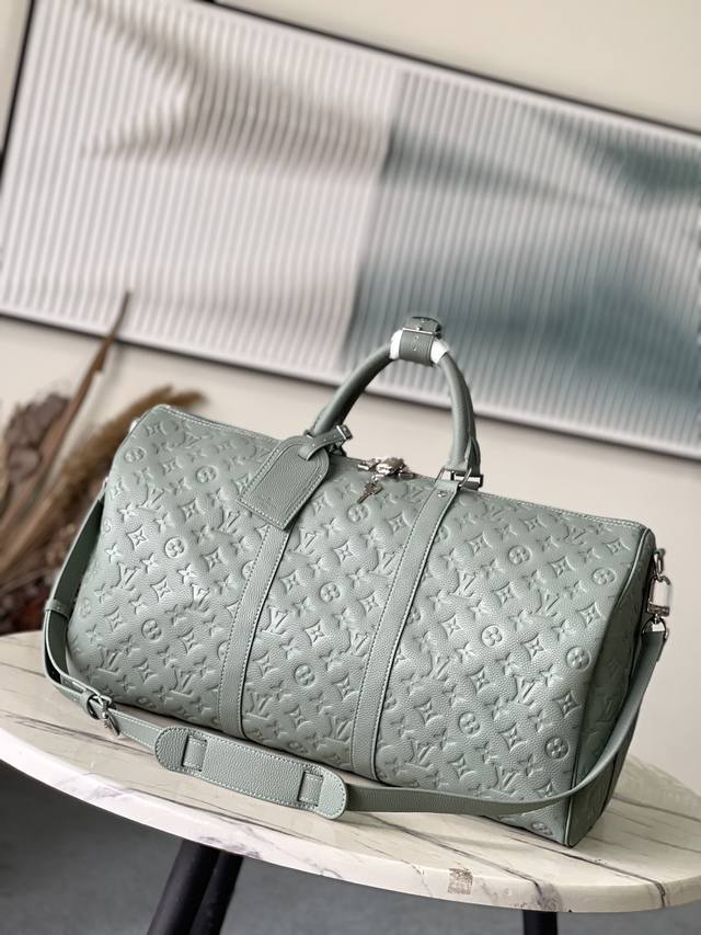 Original, top-grain leather, M13976. This classic gray-green Keepall travel bag