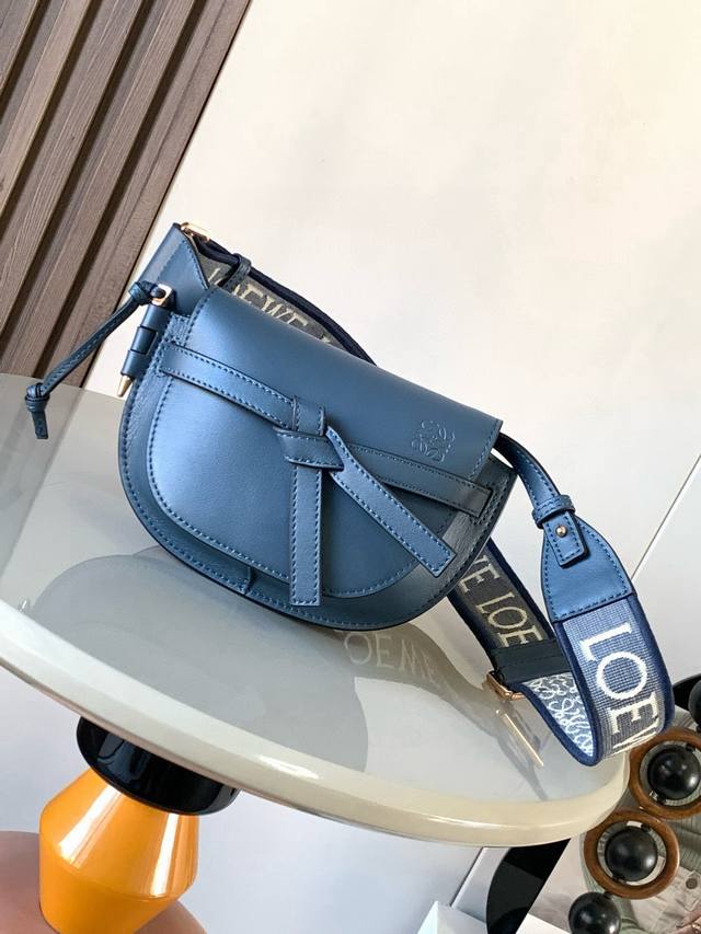 The popular mini 21cm saddle bag with new lettered wide shoulder straps. The wid