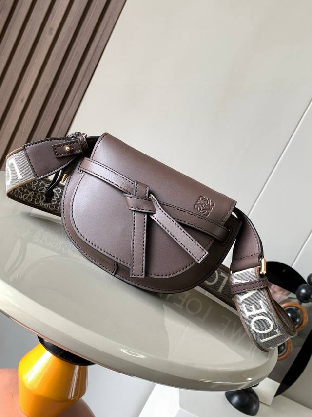 The popular mini 21cm saddle bag with new lettered wide shoulder straps. The wid