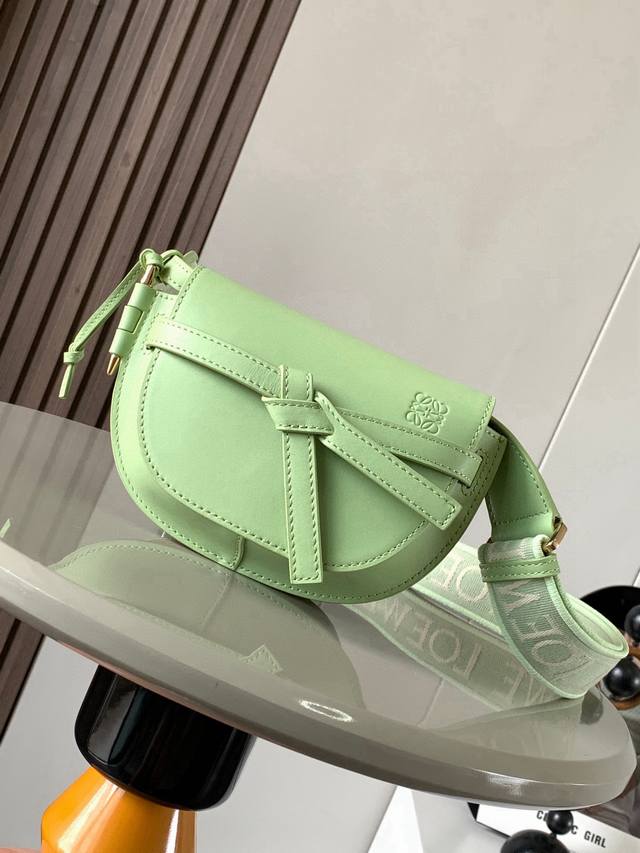 The popular mini 21cm saddle bag with new lettered wide shoulder straps. The wid