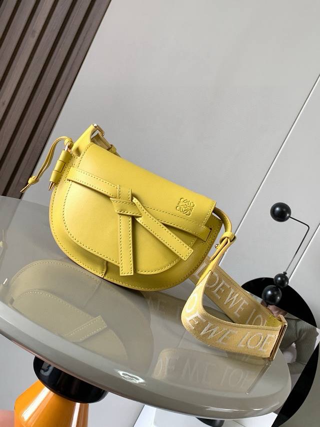 The popular mini 21cm saddle bag with new lettered wide shoulder straps. The wid