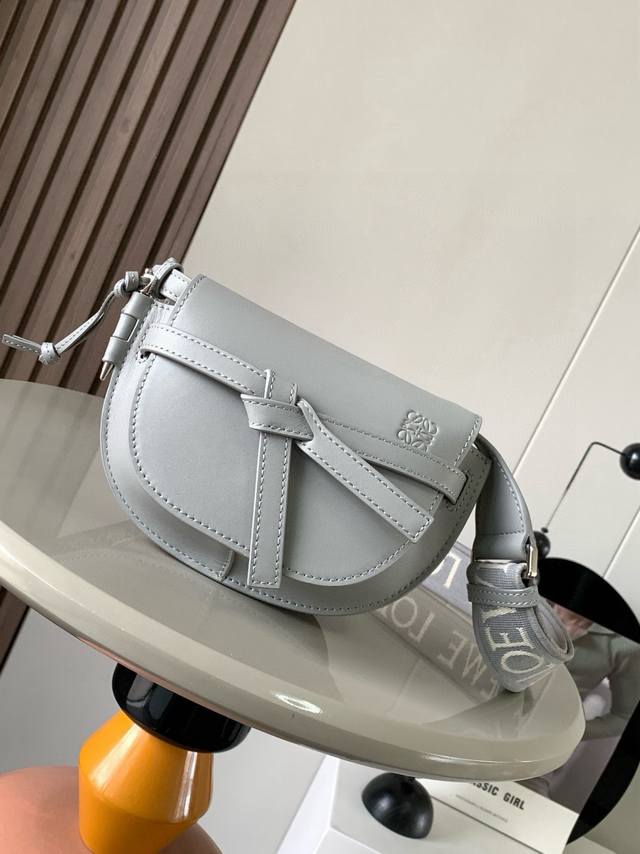 The popular mini 21cm saddle bag with new lettered wide shoulder strap. The wide