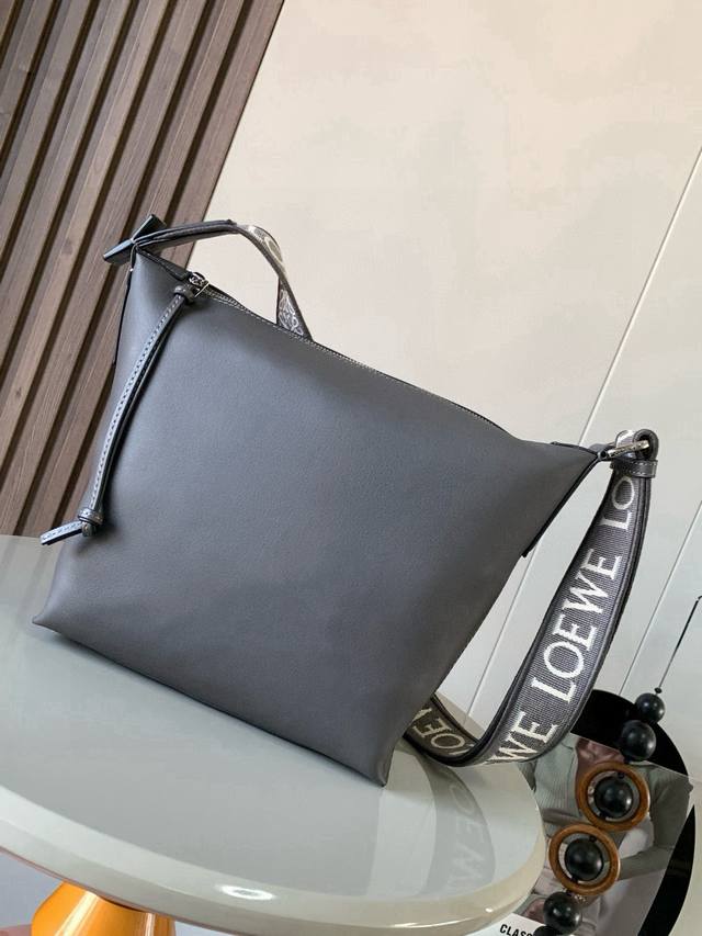 The small Cubi crossbody bag makes a stunning appearance. The Cubi is a real sur