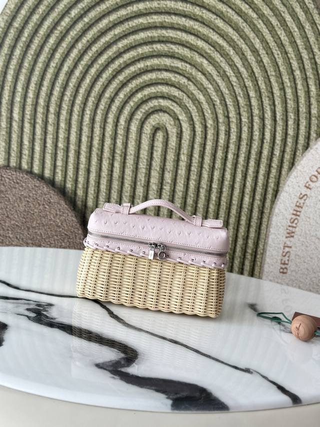 This compact Extrapocket bag combines handwoven bamboo and rattan with the brand