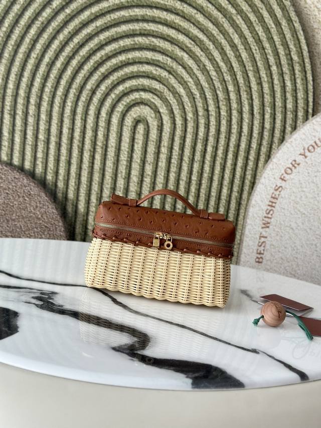 This compact Extrapocket bag combines handwoven bamboo and rattan with the bran