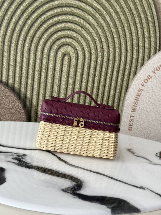 This compact Extrapocket bag combines handwoven bamboo and rattan with the brand
