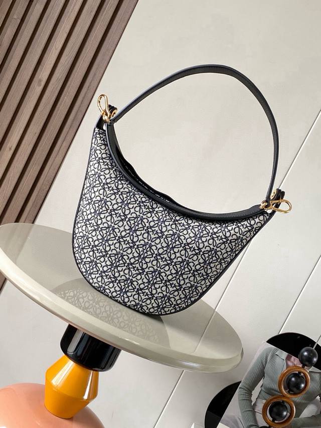 Original leather Luna half-moon Hobo handbag features a sculpted silhouette with