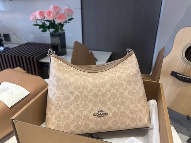 comes with a replica airplane box Size: 31*23Cm Coach's new Laurel hobo bag is