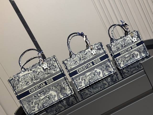 comes with a folding box scarf . Need a star pendant for an extra 30 . Dior o