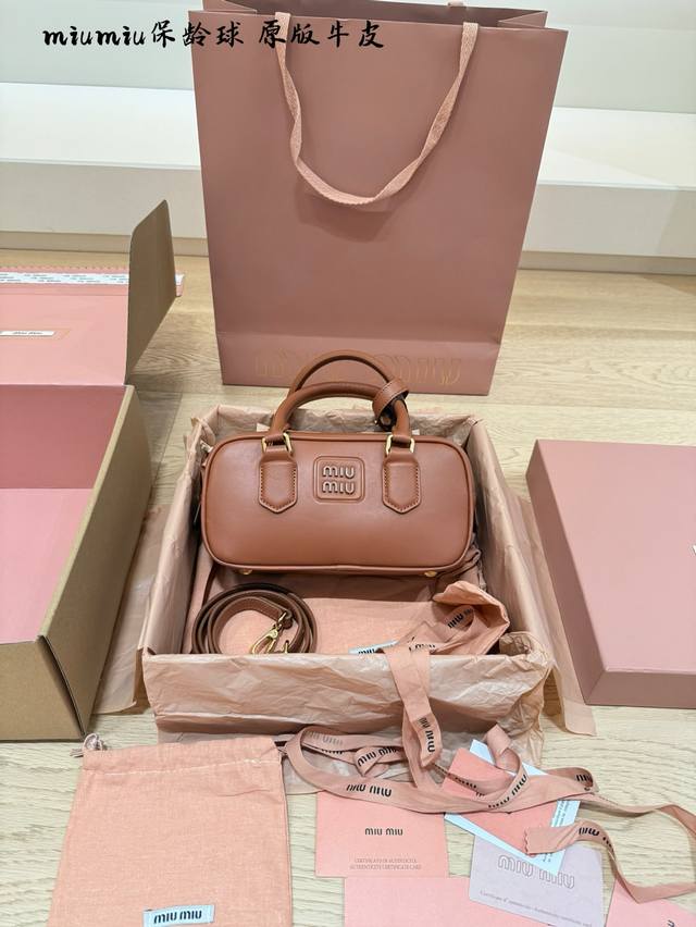 This top-tier, original Miu bowling bag is so chic, it's practically a tearjerk