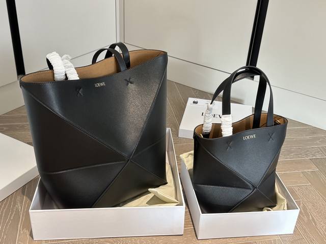 with box Size: upper width 39*33Cm large upper width 25*22Cm small Loewe puzzle