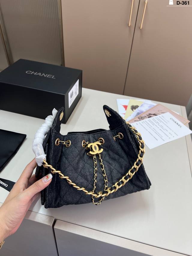 Mini Chanel Mini Drawstring Bucket Hobo Bag Suede shoulder and crossbody bag is