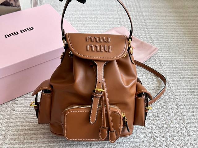 Miumiu Early Spring Fashion Essentials: The Miumiu Miu Miu Backpack. This stylis