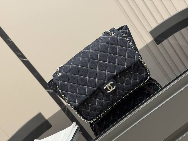 The coolest thing is Chanel's black and silver piping . This thick chain and st