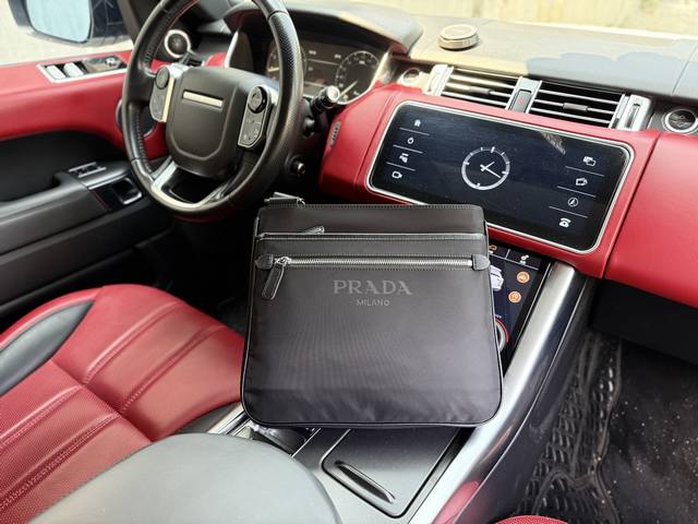 Latest high-end Prada shoulder bag. Prada messenger bag with logo and adjustable